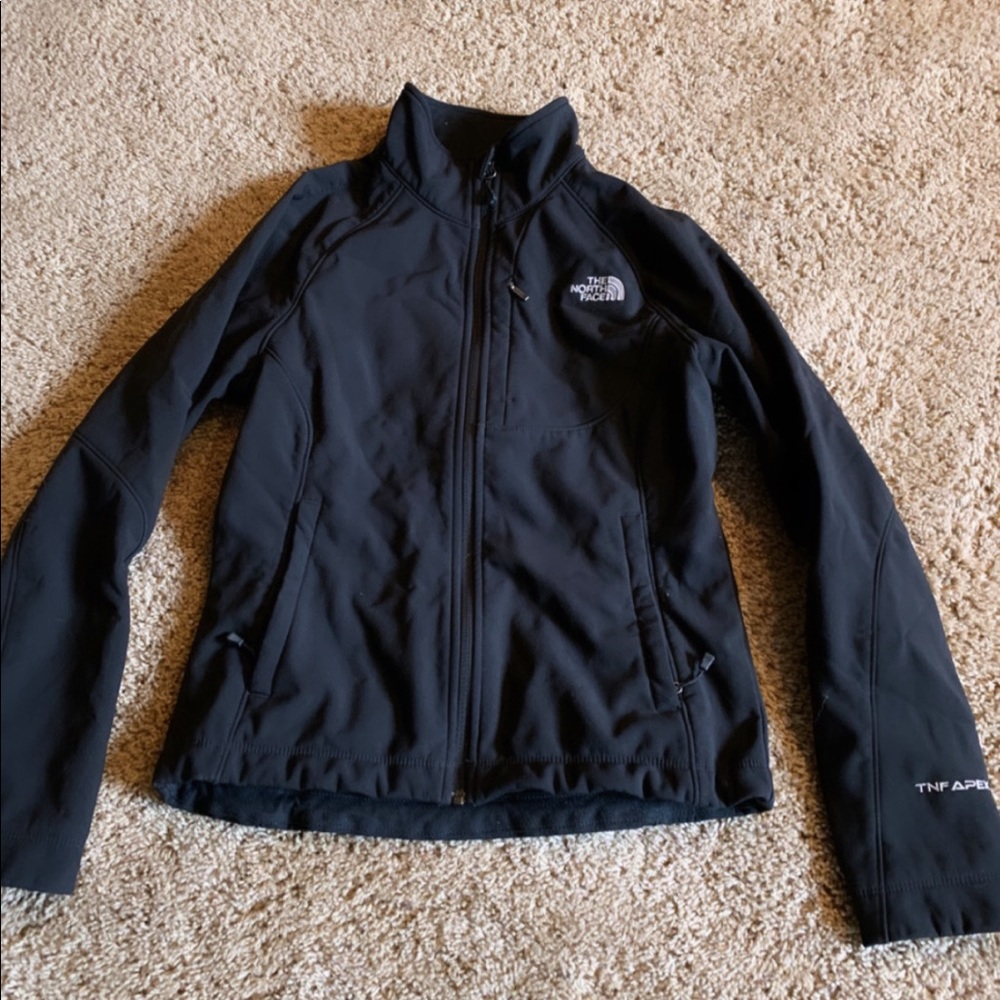 Women’s hard shell North Face with fleece lining